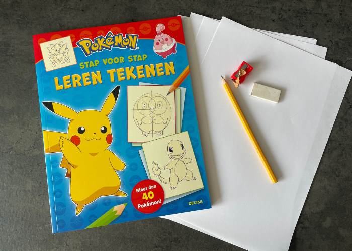 Het boek 'Pokemon stap voor stap leren tekenen'.
