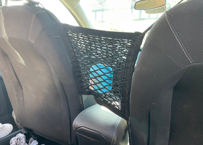 Opberger voor in de auto