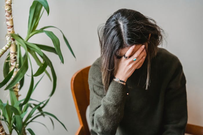Overprikkelde moeder met stress.